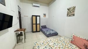 Homey Guesthouse Gubeng Syariah