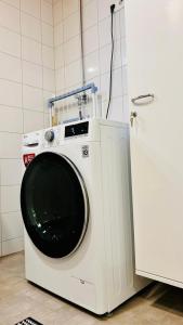 Convenient Airport Stay Beside Big Mall