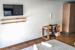 Modern studio apartment with AC and secure parking