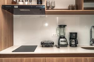 Modern studio apartment with AC and secure parking