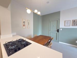 Charmoso Loft perto de tudo com garagem