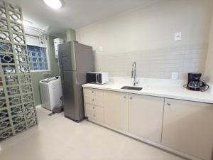 Charmoso Loft perto de tudo com garagem