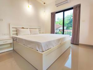 Premium Assagao 2BHK Modern Apartment with Pool