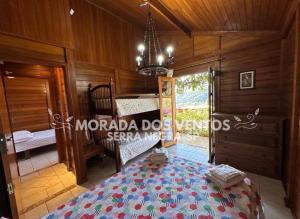 Casa de mandeira com jacuzzi - Morada dos Ventos