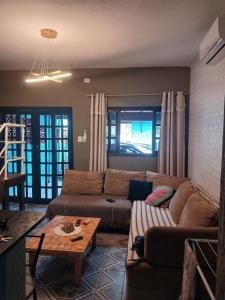 Pé na areia Massaguaçu