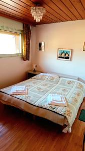 Luminoso e centralissimo attico, splendida vista panoramica sulle Dolomiti e sulle piste olimpiche