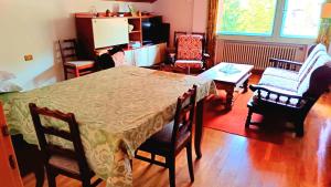 Luminoso e centralissimo attico, splendida vista panoramica sulle Dolomiti e sulle piste olimpiche