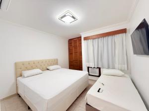 Flat estudio 110 Amarilis Riviera de São Lourenço, 03 piscina climatizada, serviço de hotelaria, limpesa e troca de toalhas diária, carregador veiculo elétrico e servico de praia finais de semana WiFi 500