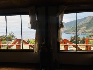 Cabaña con vista al mar y chimenea Robinson Crusoe