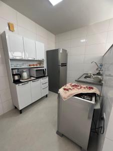 Apto confortavel em prédio de frente para o Mar