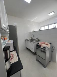 Apto confortavel em prédio de frente para o Mar