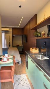 Flat a 100 metros do mar