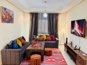 Darraha-Ideal early & late flights-Next to Menara-RAK Airport 10 min-WIFI-AC- Transport Support