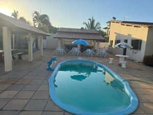 Casa de Praia com Piscina em frente à praia para até 32 pessoas