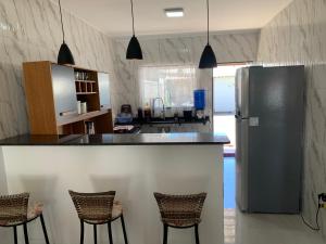 Casa temporada orla 500 unamar