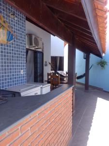 Casa pé na areia