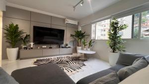 Apartamento à 1 min da praia com linda vista cultural e 4 quartos !