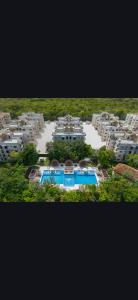 Selva Escondida 2 Departamento con Alberca y Gym