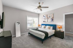 Spacious 3-Bedroom Home with Workspace near Uptown & Airport