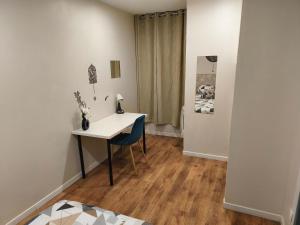 Appartement RDC avec parking au centre-ville