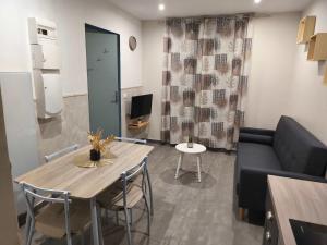 Appartement RDC avec parking au centre-ville