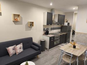 Appartement RDC avec parking au centre-ville