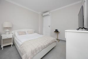 Foksal 1A Studio Apartments by Solarento