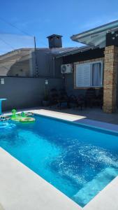 Casa com piscina em Rainha do Mar Xangri-lá