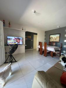 Casa de Praia: 4 Quartos, 3 Suítes, Próximo a Praia