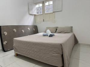 Casa de Praia: 4 Quartos, 3 Suítes, Próximo a Praia