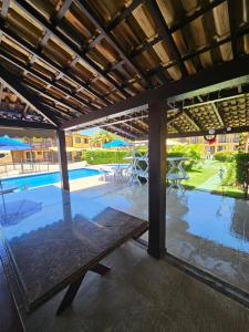 2 quartos com ar condicionado, piscina, sauna e churrasqueira