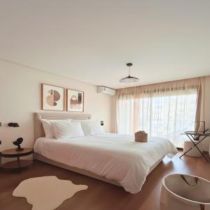 ORA Luxoria Suite Racine & Gym by Staycationcasa