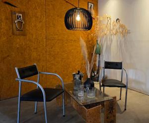 Plumas verde, casa campo