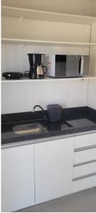 Kitnet container 30 metros da praia 6 km Beto carrero