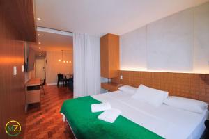 Studio moderno, renovado e perto da praia