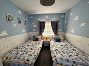 4 bedroom family home - steps away from the beach