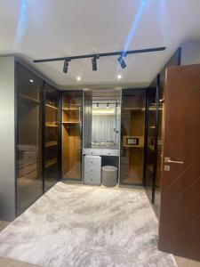 luxury, hotel-style apartment near Abbas El-Akkad and Makram Ebeid, with high-end finishing and furnishing, first-time occupancy
