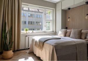 Modernin kaksio keskustassa autopaikalla