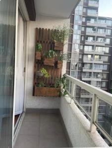 Disfruta el Centro de Santiago con lavadora y Aire acondicionado