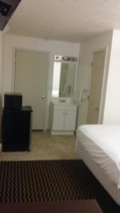 Queen Room with Two Queen Beds room in Super 54 Inn