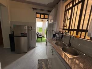 Aries Executive Suites -Executive 1 BR, Secure Parking ,Fast WI-FI ,Work desk -B106