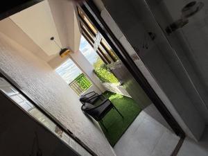 Aries Executive Suites -Executive 1 BR, Secure Parking ,Fast WI-FI ,Work desk -B106