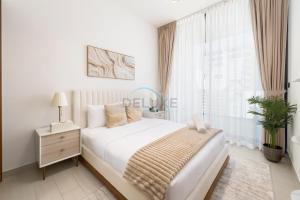 Close to Community Park, Minutes Walk from Circle Mall, and Short Drive to Dubai Miracle Garden and Butterfly Garden - Binghatti Amber, JVC by Deluxe Holiday Homes