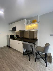 7DusitD2 Hua Hin - One bedroom with a beautiful view of the garden and pool