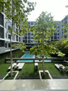 7DusitD2 Hua Hin - One bedroom with a beautiful view of the garden and pool