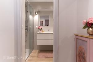 Coastal retreat with Private patio steps from beach