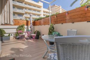 Coastal retreat with Private patio steps from beach