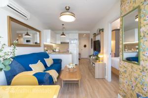 Coastal retreat with Private patio steps from beach