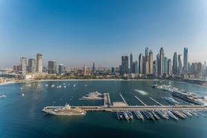 Direct Private Beach Access, Proximity To Key Dubai Attractions Like Dubai Marina, Palm Jumeirah, And JBR Walk - Palace Beach Residence Tower 2, Emmar Beachfront by Deluxe Holiday Homes