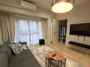 Charmant appartement avec chambre cosy et canapé convertible